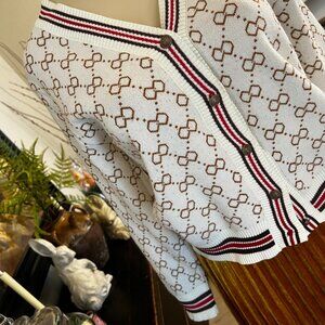 chic happens Cardigan red&brown striped trim w/ brown geometric design'